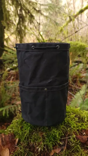 Black Waxed Canvas Cedar Bucket Bag with Outside Pockets.