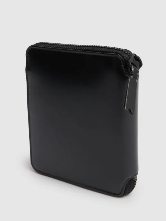 Comme des Garçons Wallet   Leather zip wallet 