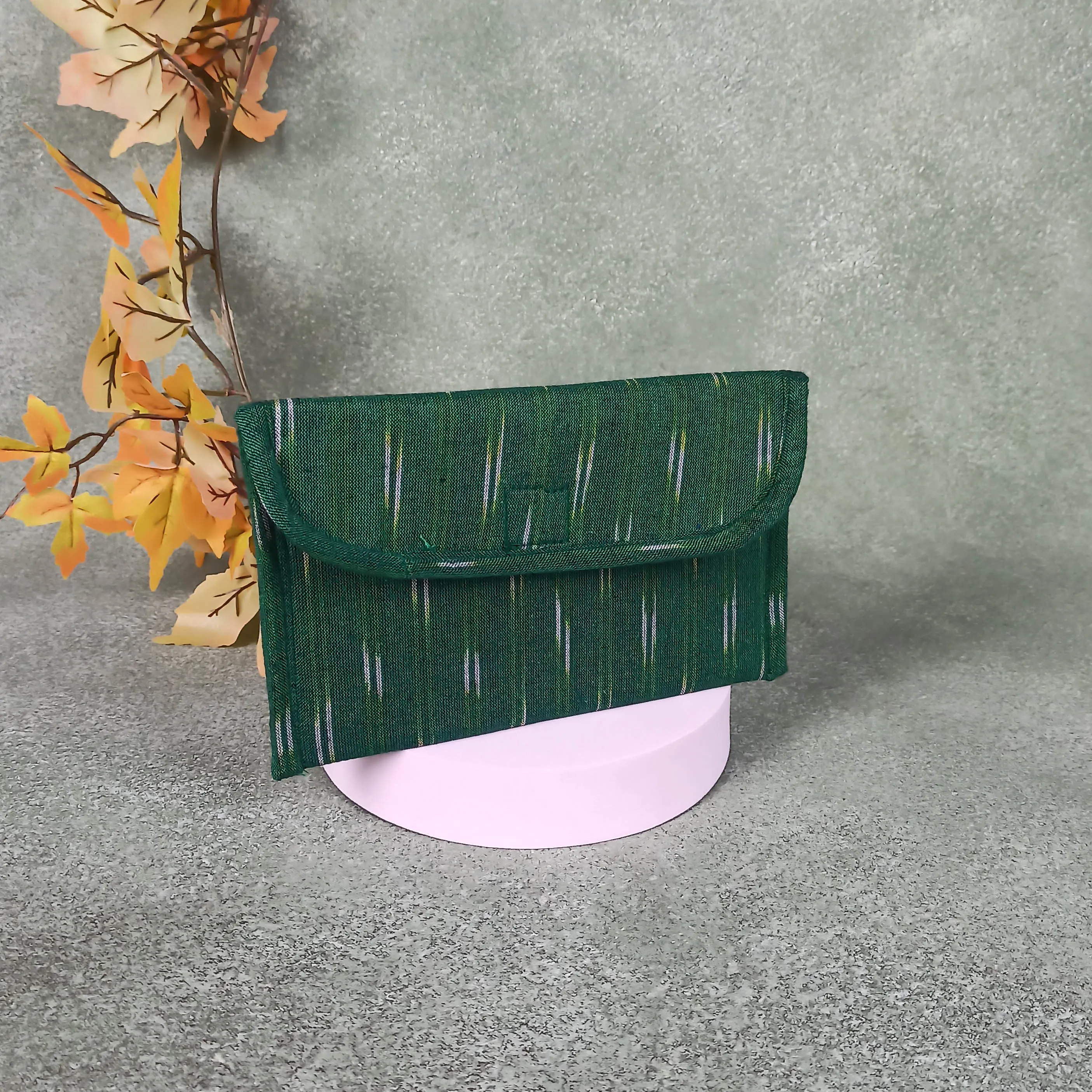 Ikat Clutch Green Colour With White Two Line Design.